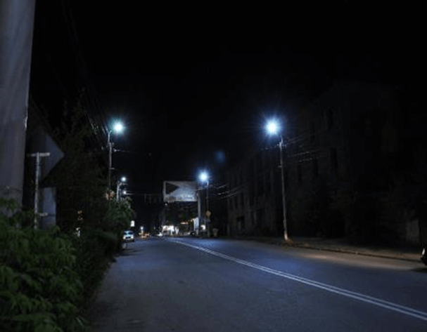 Photo of street lights in the dark in Armenia.